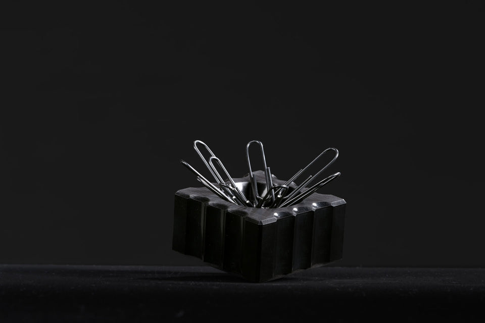 black paperclip holder